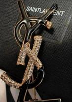 Authentieke YSL broche zwart/goud & strass & Black Opium edp, Sieraden, Tassen en Uiterlijk, Broches, Overige materialen, 4 tot 7 cm