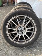 Winterbanden met Velg 215/50 R17, Ophalen, Gebruikt