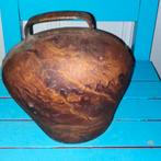 Oude koeienbel, Ophalen