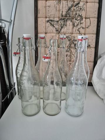 7 glazen weck- beugelflessen, inhoud 75 cl beschikbaar voor biedingen