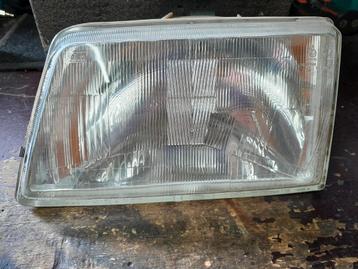 Koplamp Peugeot 205 links i.z.g.s.  beschikbaar voor biedingen