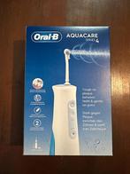 Oral-B AquaCare 4 waterflosser | GLOEDNIEUW, garantie, Ophalen of Verzenden, Nieuw, Mondverzorging