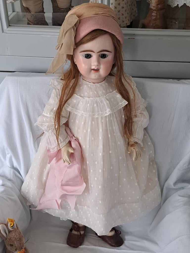 Antieke pop  E11D, Ophalen