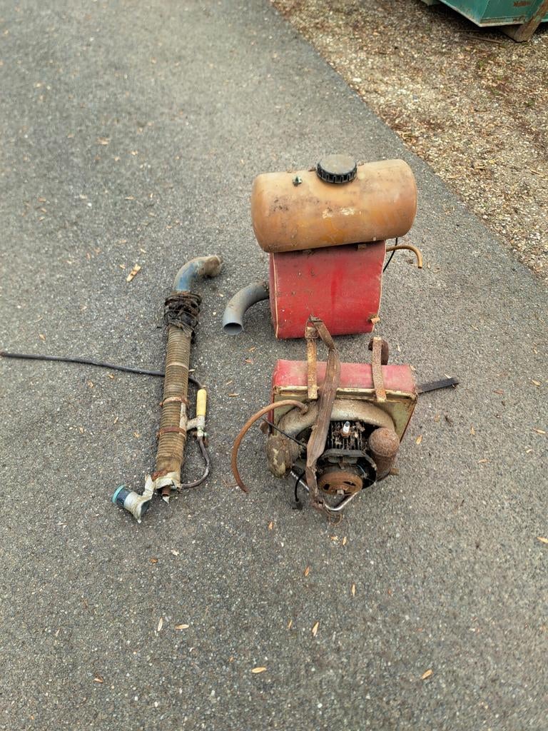 Rugspuit op benzine, Ophalen