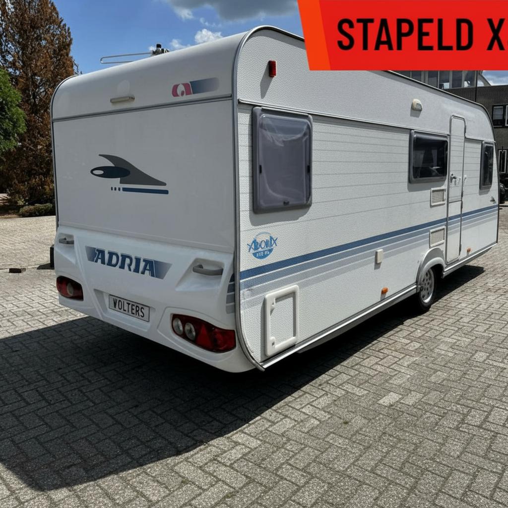 Adria Adora 552 PK caravan 2005 goede staat | Nieuwe mover, Standaardzit, Vast bed, 7 tot 8 meter, Koelkast