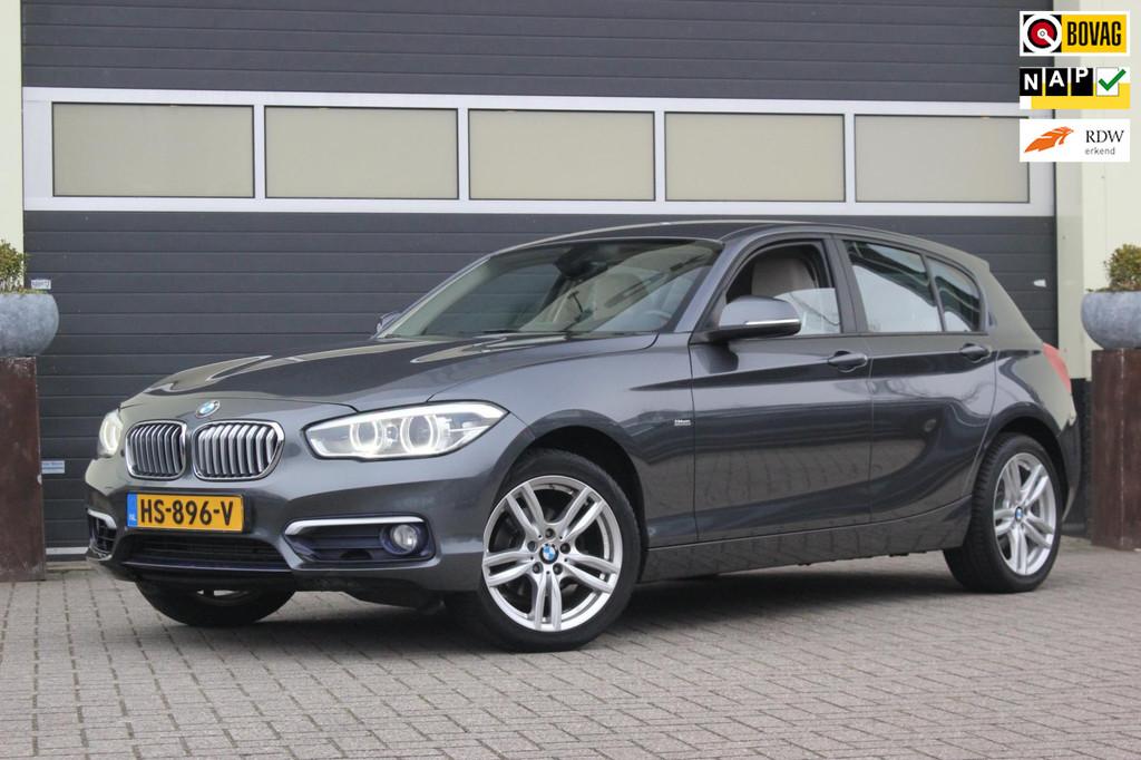 BMW 1-serie 118i Centennial High Executive | Leer | Camera |, Auto's, BMW, Gebruikt, 650 kg, 3 cilinders, 1300 kg