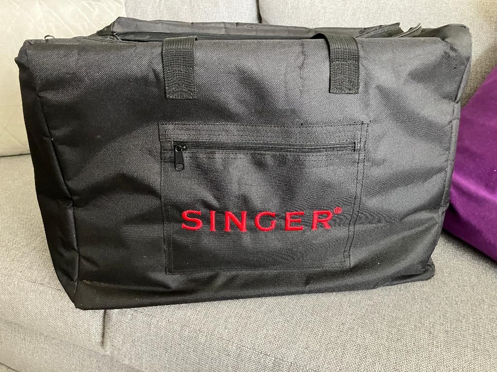 SINGER Naaimachine tas, Ophalen