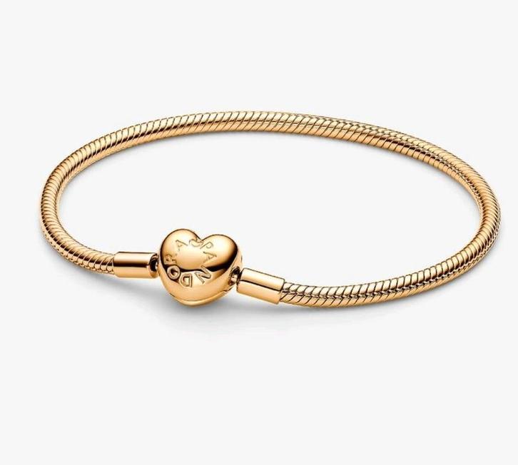 Nieuw in doos en tas: pandora armband goud, Sieraden, Tassen en Uiterlijk, Armbanden, Nieuw, Goud, Goud, Ophalen of Verzenden