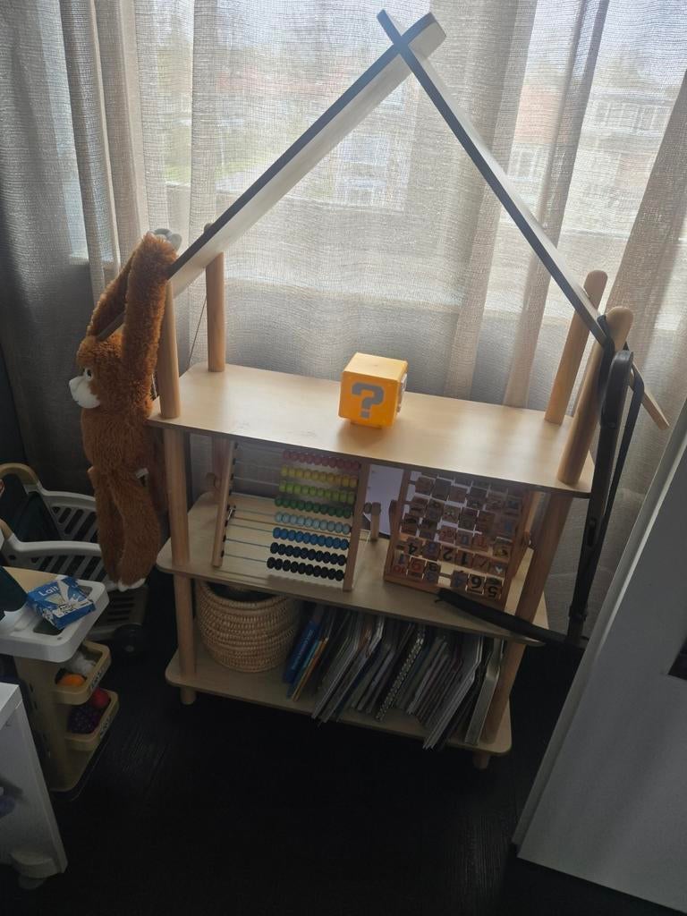 Sklum kinder boekenkast, Ophalen