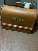 Antieke Singer Naaimachine, Ophalen