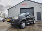 Hyundai Tucson 2.0i Dynamic Cross AIRCO, Auto's, Hyundai, Stof, Zwart, 4 cilinders, Zwart