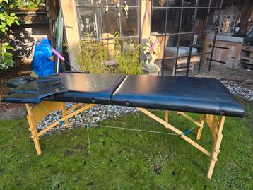 Massagetafel (inklapbaar) inclusief arm- en hoofdsteunen beschikbaar voor biedingen