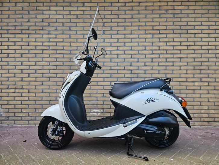 Sym Mio 50 4 Takt snorscooter (25KM) 6095KM & windscherm!, Fietsen en Brommers, Scooters | SYM, Zo goed als nieuw, Mio, Maximaal 25 km/u
