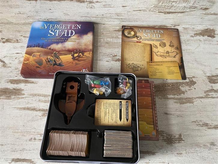 De vergeten stad white goblin games [s342], Hobby en Vrije tijd, Gezelschapsspellen | Bordspellen, Zo goed als nieuw, Ophalen of Verzenden