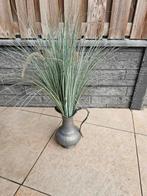 Tinnen kan met kunstsprieten, Ophalen