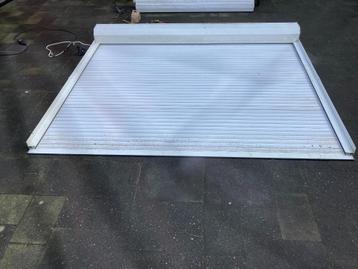 wit electrisch rolluik breed 2.22,5 x 1.86 mtr hoog beschikbaar voor biedingen