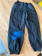 Nike trainingsbroek 147-158, 12 jaar, Ophalen of Verzenden, Zo goed als nieuw, Regenjas