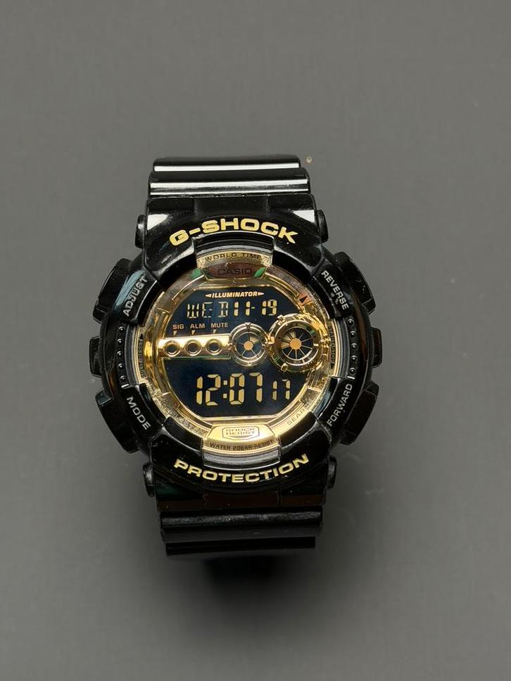 Casio G-Shock GD-100GB (Gold Black Edition), Sieraden, Tassen en Uiterlijk, Sporthorloges, Gebruikt, Android, Zwart, Verzenden