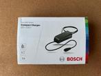 Bosch Compact Charger 100-240V, Fietsen en Brommers, Fietsaccessoires | Fietsaccu's, Ophalen of Verzenden, Zo goed als nieuw