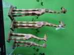 Houten giraffen familie, Ophalen