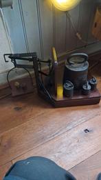 Antieke bascule met gewichten, Ophalen