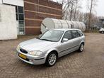 Mazda 323 1.5 F LX 1999 Grijs - AUTOMAAT - APK 03/26 -, Auto's, Mazda, Stof, 1498 cc, Zwart, 4 cilinders
