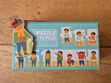 Leuke aankleedpuzzel voor kinderen beschikbaar voor biedingen