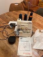 Toyota lockmachine, Hobby en Vrije tijd, Naaimachines en Toebehoren, Ophalen of Verzenden, Gebruikt, Lockmachine, Overige merken