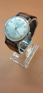 Goed werkend vintage horloge Lasita, Overige merken, Staal, Ophalen of Verzenden, Leer