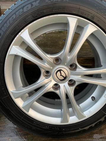Mazda 16 inch velgen met winterbanden beschikbaar voor biedingen