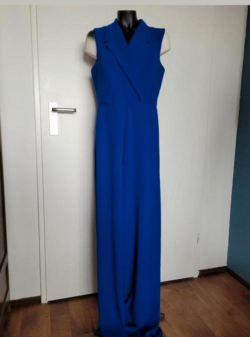 Kobaltblauwe jumpsuit mouwloos met transparant rugdeel €30, Kleding | Dames, Jumpsuits, Zo goed als nieuw, Maat 42/44 (L), Blauw