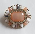 Vintage ovale oranje witte strass broche, Overige materialen, 4 tot 7 cm, Gebruikt, Ophalen of Verzenden