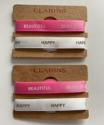 Clarins - Lintjes met Happy en Beautiful - Roze Wit Lint, Ophalen of Verzenden, Verzorging