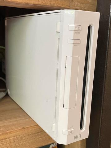 Nintendo Wii + balance board + controllers + games beschikbaar voor biedingen