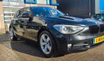 BMW 1-Serie 116I 100KW 5DR 2012 Zwart 116i F20, Auto's, BMW, 1-Serie, Euro 5, Zwart, 4 cilinders