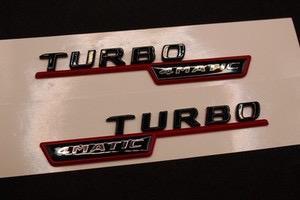 Mercedes-Benz TURBO 4MATIC logo set – zwart met rood beschikbaar voor biedingen