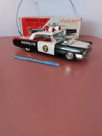Oude blikken Rijkspolitie Cadillac met doos. Ichiko Japan., Antiek en Kunst, Antiek | Speelgoed, Ophalen of Verzenden
