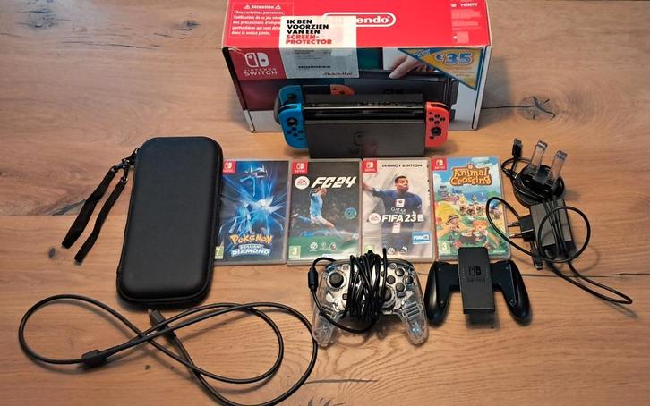 Nintendo Switch met accessoires en games, Spelcomputers en Games, Spelcomputers | Nintendo Switch, Gebruikt, Switch Original, Met 3 controllers of meer