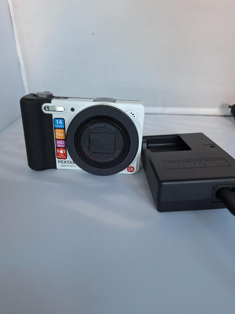 PENTAX Optio RZ10 compact camera in nieuwstaat, Audio, Tv en Foto, Fotocamera's Digitaal, 14 Megapixel, Compact, Ophalen of Verzenden