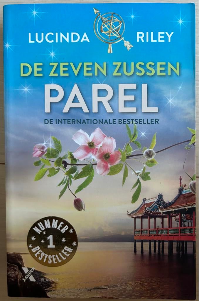 De Zeven Zussen - Parel (Lucinda Riley), Ophalen of Verzenden, Zo goed als nieuw