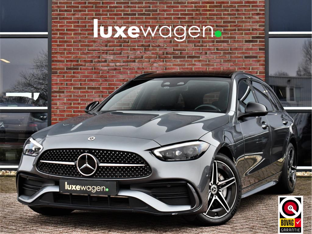 Mercedes-Benz C-Klasse Estate 300 e AMG Line Pano Trekh Dist, Auto's, Automaat, 12 maanden, Zwart, 4 cilinders