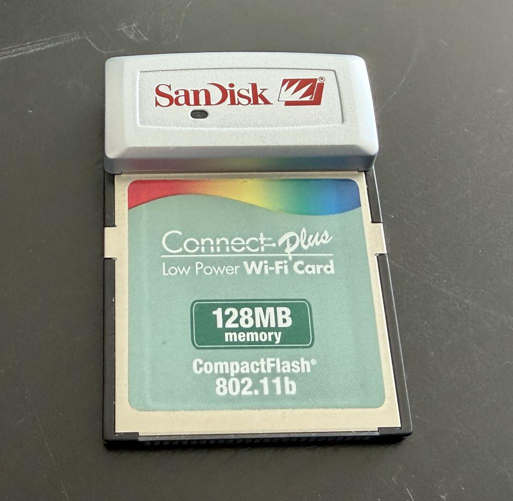 SanDisk 128MB + 802.11b WiFi CompactFlash-kaart (SDWCFB-128), Audio, Tv en Foto, Fotografie | Geheugenkaarten, Zo goed als nieuw
