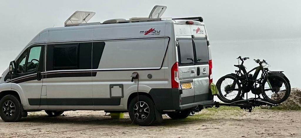 Buscamper Carthago Malibu 600DB - 150 PK automaat, Caravans en Kamperen, Campers, Automaat, Ringverwarming, Fiat, Tot en met 2