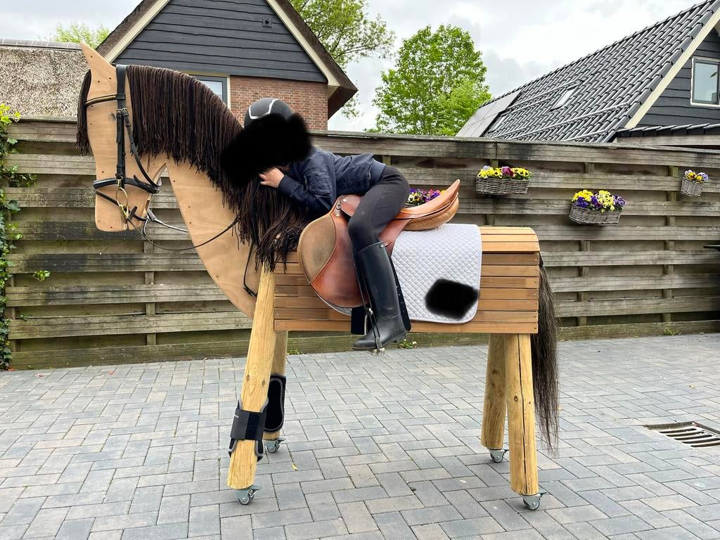 Houten paard, Ophalen