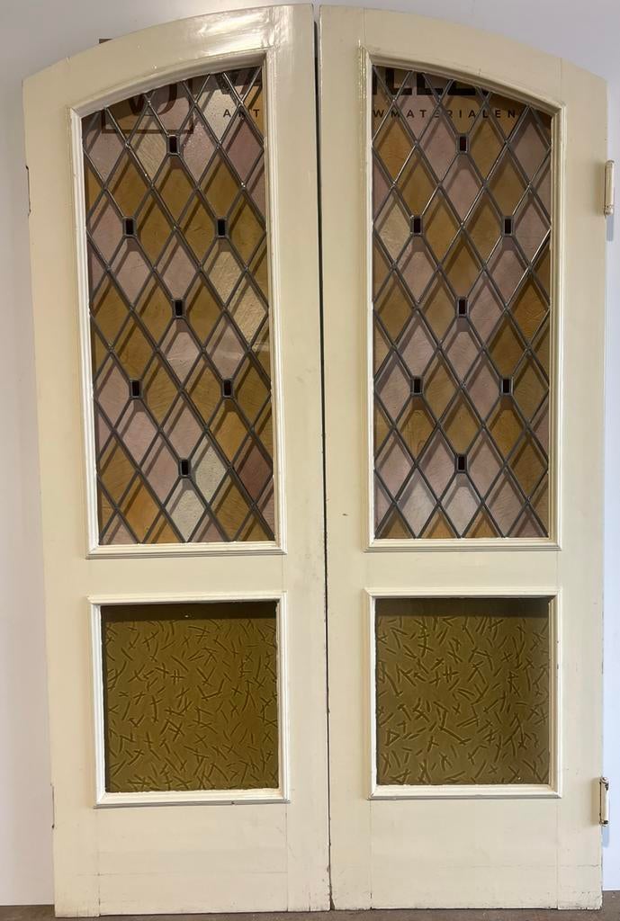 Antieke ensuite vouwdeuren erg hoog met glas in lood