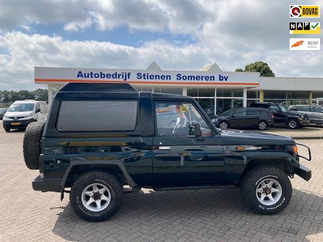 Toyota LandCr. H.Duty 4.2 LX Van HR FRP, Auto's, Bestelauto's, 4x4, Centrale vergrendeling, Lederen bekleding, Metallic lak, Trekhaak