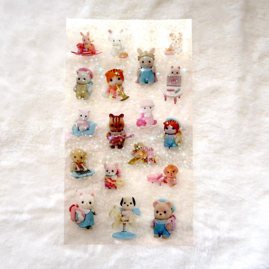 Sylvanian Family Stickervel met hologram ster afwerking, Verzamelen, Verzenden, Overige figuren, Nieuw, Plaatje, Poster of Sticker