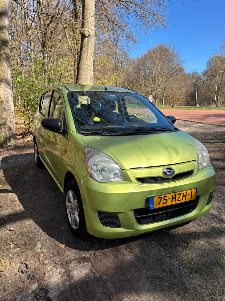 Daihatsu Cuore 1.0 5D 2009 Groen, Auto's, Daihatsu, Voorwielaandrijving, 600 kg, Zwart, 18 €/maand