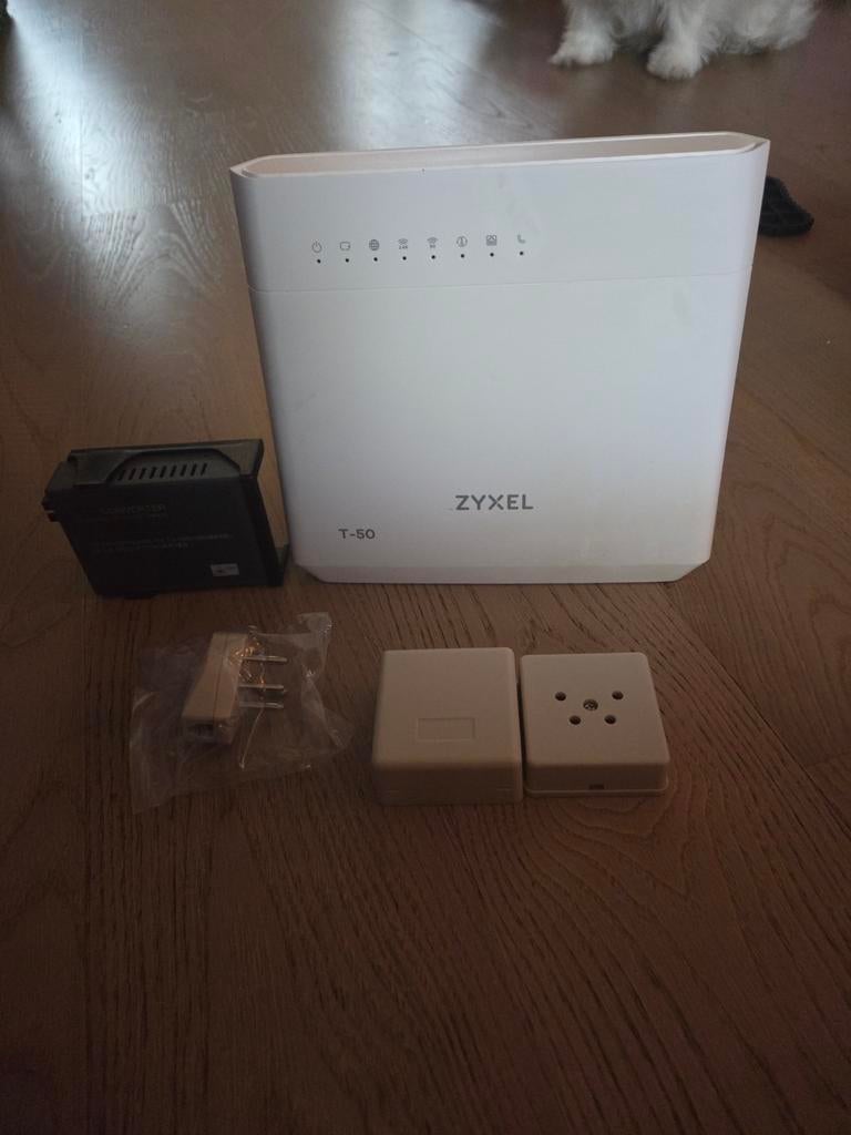 Zyxel T-50 modem en media converter glasvezel, Ophalen