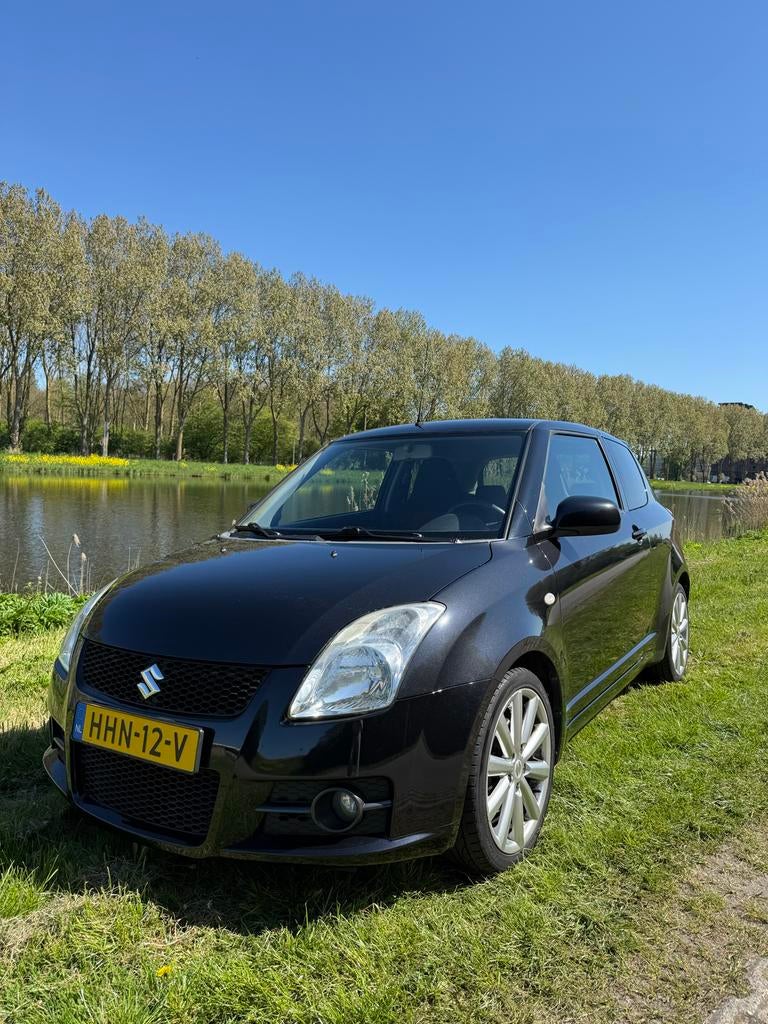 Suzuki Swift 1.6 3D Sport 2010 Zwart, Voorwielaandrijving, 1005 kg, 4 cilinders, Stoelverwarming